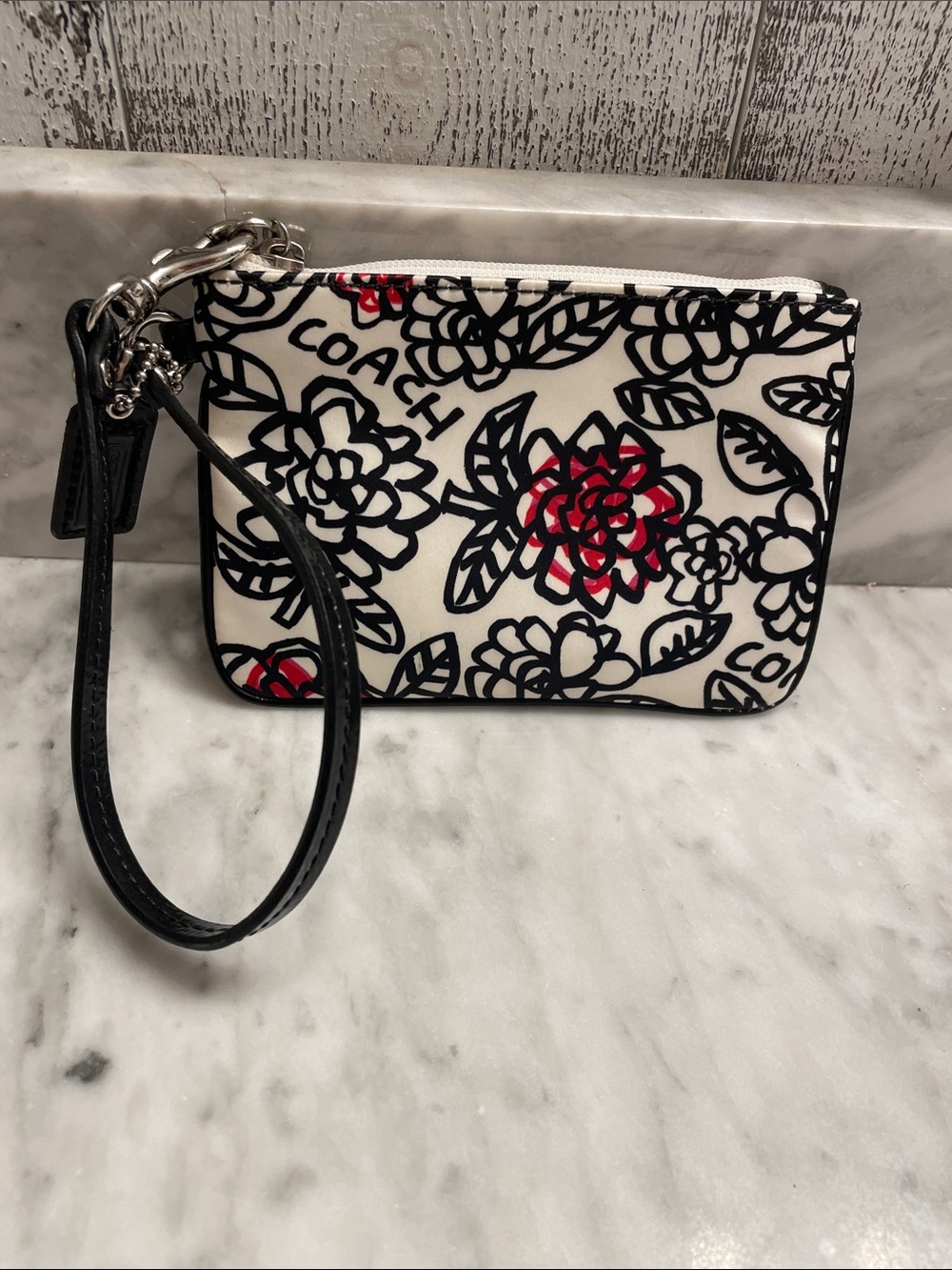 Coach Black White and pink poppy Floral Wristlet